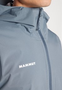 Mammut LINARD LIGHT HOODED JACKET MEN - Nepropusna jakna - strata/silver sage