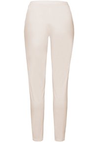 Beige legging met een elastische tailleband, slim fit en een gladde stofstructuur. Geen zichtbare patronen of hardware details.
