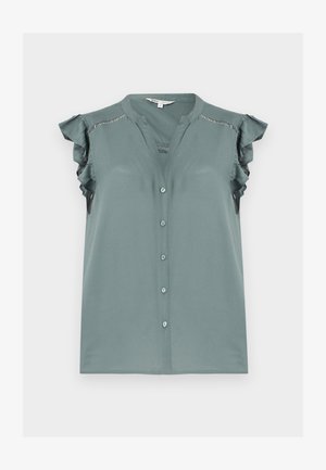 Αμάνικη ανοιχτό τιρκουάζ μπλούζα με κουμπιά μπροστά, βολάν στους ώμους και διακριτική δαντέλα κατά μήκος του άνω μέρους του στήθους και των ώμων.