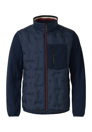 Granatowa pikowana kurtka z pełnym czerwonym zamkiem błyskawicznym, wysokim kołnierzem, zamykaną na zamek kieszenią na piersi oraz elastycznymi mankietami na długich rękawach.