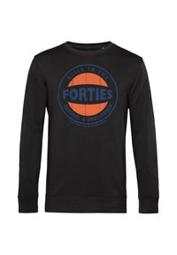 Sudadera negra de manga larga con un logo redondo en naranja y azul que dice "Construido en los años cuarenta, Original y sin restaurar" en el pecho.