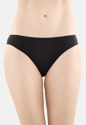 Culotte bikini in cotone nero con design a vita bassa e fascia elastica sottile, caratterizzata da una texture liscia e dettagli di cucitura minimi.