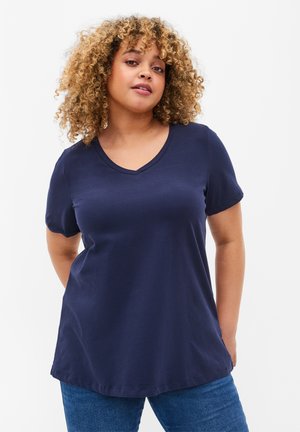Marinblå V-ringad t-shirt med korta ärmar, tillverkad av mjukt tyg. Har en avslappnad passform och en lätt böjd nederkant.