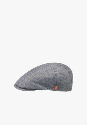 Gray linen flat cap with small round brown logo badge on side, showing textured fabric and stitched panel design.