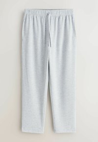 Pantalon de survêtement gris clair avec taille élastique, cordon de serrage et poches latérales, présenté sur un fond blanc uni.