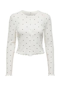 Gilet blanc à manches longues avec des pois noirs, col rond, fermeture à boutons sur le devant et ourlet festonné. Matière douce et extensible.