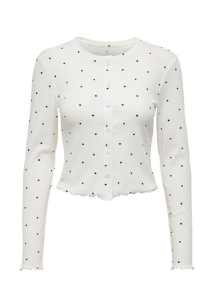 Gilet blanc à manches longues avec des pois noirs, col rond, fermeture à boutons sur le devant et ourlet festonné. Matière douce et extensible.