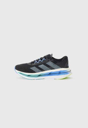 ADISTAR BYD - Road running shoes - core black/grey/blue fusion