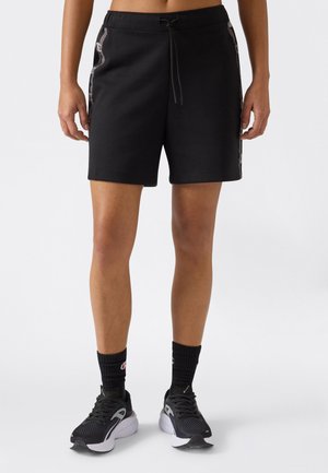 - Spodnie treningowe