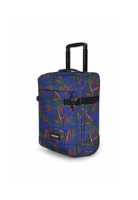 Valigia a rotelle in tessuto blu con motivo di foglie verdi e rosse, manici telescopici doppi, chiusura con zip e cinturino laterale con fibbia.