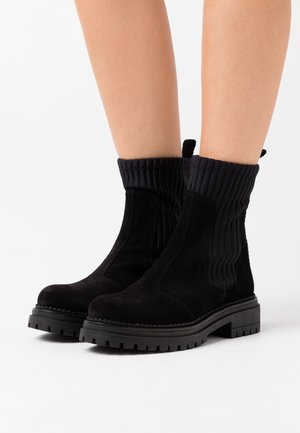 Ca'Shott, Bottines à plateau - black