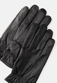 Black leather gloves with five fingers, soft texture, gathered wrist detail, and smooth finish. Suitable for cold weather use.