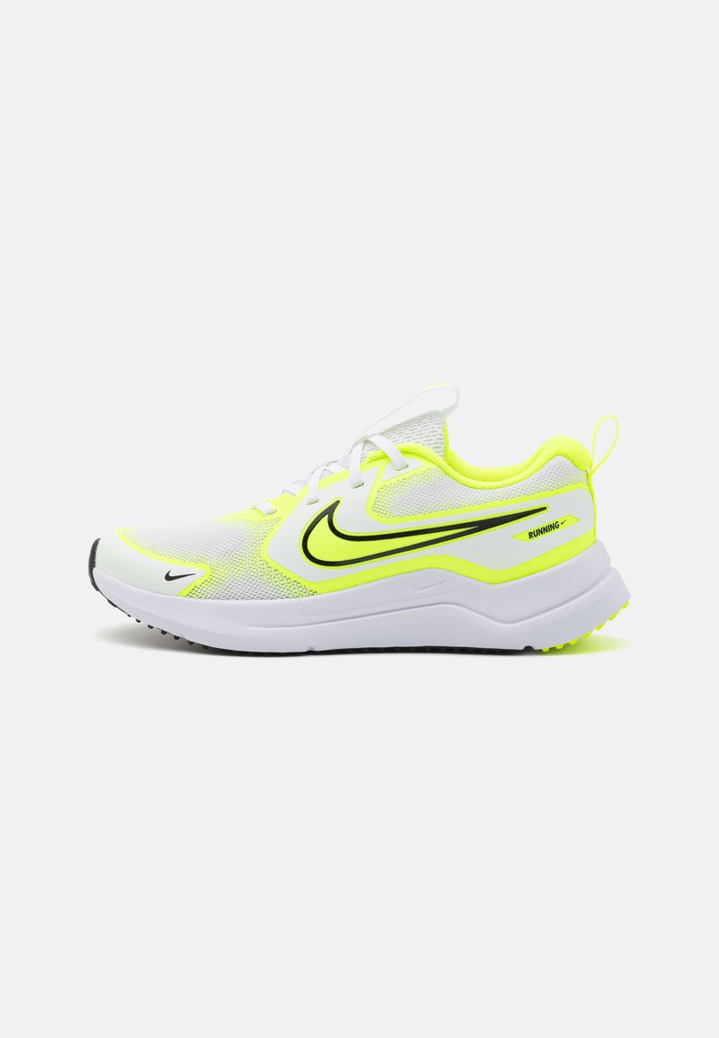 White athletic shoe with mesh upper, bright yellow accents, black detailing, and a cushioned sole, featuring a prominent Nike swoosh.