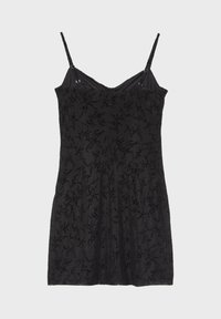 Robe noire sans manches avec fines bretelles ajustables et motif floral subtil en velours sur tissu transparent.