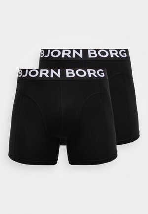 Mustad puuvillast bokserid valge "BJORN BORG" logoga elastsel vöökohal, tiheda lõike ja siledapinnalisena.