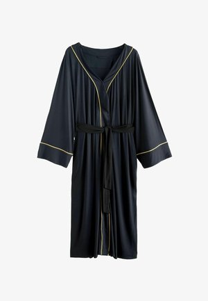 Must mustri, millel on kollased äärised, valmistatud pehmest kangast. Omab vöödiga taljet, laiu varukaid ja kraeotst.Lihtne disain voolava kujuga.