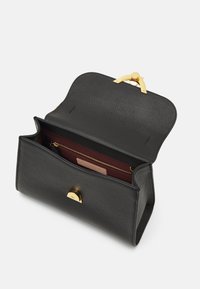 Black leather handbag with a textured finish. Features a gold-tone clasp and a maroon interior with a zippered pocket.