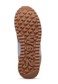 Sulksole med en texturerad gummidesign med stjärnmönster. Ljusbrun färg med rund tå och upphöjd logotyp.