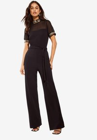 Friends Like These HIGH NECK SHORT SLEEVE SEQUIN T REGULAR FIT
 - Haalari - black
