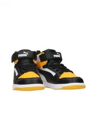 Sneaker alte nere e gialle con dettagli bianchi, dotate di una parte superiore testurizzata, due cinturini in velcro e una suola in gomma.