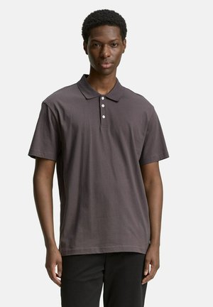 Polo shirt gris foncé en coton lisse, doté d'un col classique et d'une patte de boutonnage à trois boutons. Manches courtes, ourlet droit.