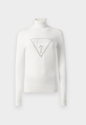 Maglione bianco a collo alto con polsini e orlo a coste, caratterizzato da un logo triangolare Guess ornato di cristalli con un punto interrogativo sul davanti.
