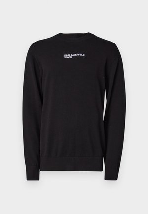 Crni pleteni džemper s okruglim izrezom, rebrastim manžetama i donjim rubom, s bijelim logotipom "KARL LAGERFELD JEANS" na gornjem prednjem dijelu.