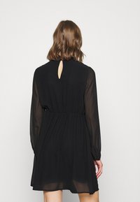 Vero Moda Koktejlové šaty / šaty na párty - black
