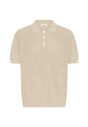 Polo à manches courtes en maille beige clair. Présente un design texturé, un col classique et trois boutons à l'avant.