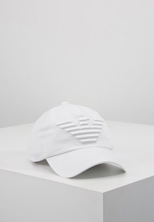 Witte baseballpet van katoen, voorzien van een verhoogd strepenlogo aan de voorkant. Efficiënte textuur met een gebogen klep en een verstelbare band.