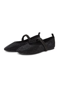 Zapatos planos negros con puntera puntiaguda, adornados con brillantes strass, que cuentan con una tira elástica negra ligeramente fruncida en el empeine.