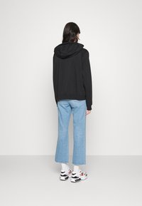 Levi's® RIBCAGE CROP BOOT - Calças de ganga bootcut - jazz away