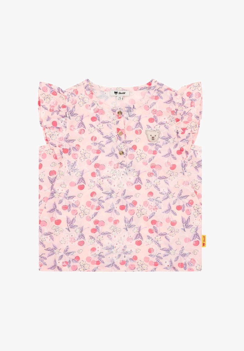 Top rose à manches courtes avec motifs floraux et fruités, manches à volants, patte de boutonnage et un appliqué ours en décoration.