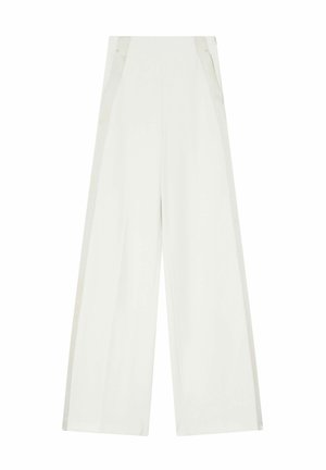 Pantalons àlarge jambe en tissu texturé blanc, avec une taille haute et des poches latérales. Lignes épurées avec des détails accentués de tons neutres.