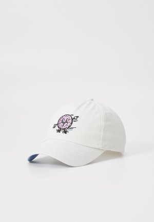 White cotton baseball cap featuring a purple donut graphic with cartoon eyes and arms, roller skating with a blue accent under the brim.