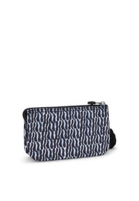 Rectangular fabric pouch with black and white abstract wavy pattern, top zipper, and small black pom-pom zipper pull.