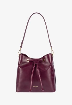 Burgundy leather bucket bag with adjustable shoulder strap, drawstring closure, gold-tone hardware, and ROECKL logo on front.