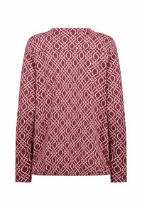 Dlhý rukáv top vo farbe burgundská červená s bielym geometrickým vzorom, s okrúhlym výstrihom a voľným strihom. Vyrobený z mäkkej, textúrovanej tkaniny.