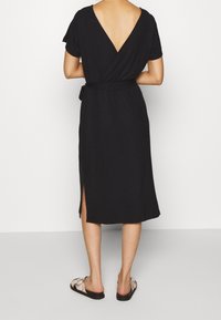 Object Trikoomekko - black