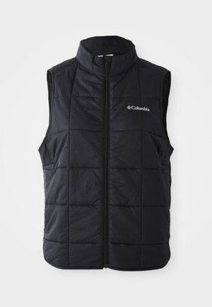 Gilet matelassé noir avec un col haut, motif matelassé horizontal, fermeture éclair à l'avant et logo Columbia sur la poitrine gauche. Matériau léger.