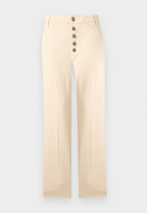 Beige high-waist trousers with five decorative round brown buttons down the front and straight wide legs.