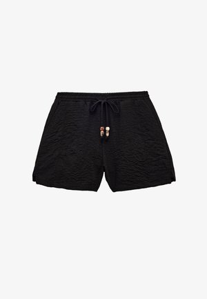 Schwarze, strukturierte Shorts mit elastischem Bund und Kordelzug, verziert mit dekorativen Perlen, entworfen für die Freizeit.