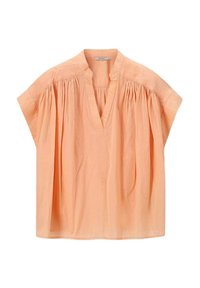 Blouse en coton couleur pêche avec un col en V, des manches courtes et des détails froncés aux épaules. Tissu léger avec une coupe ample.