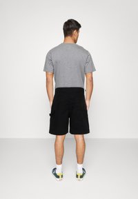 McKenzie Pantaloncini Luna in Verde | JD Sports
