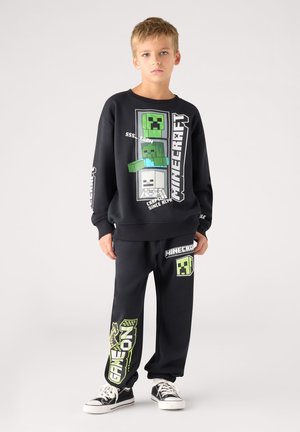 Terranova, PANTALONI TUTA LUNGHI CON STAMPA MINECRAFT® - Pantaloni sportivi - nero