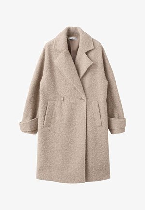 Abrigo beige de doble botonadura hecho de lana texturizada, con cuello de muesca y bolsillos laterales, puños enrollados y un acabado suave.