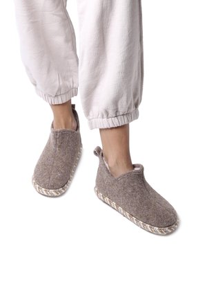 Brown felt slippers with a soft textured upper and patterned woven sole. Slip-on design with rounded toes and no fastening.