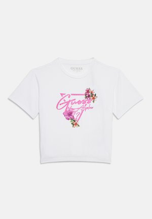 Weißes Crop-T-Shirt mit pink glitzerndem Guess-Logo und "Los Angeles", verziert mit pinken und weißen tropischen Blumen.