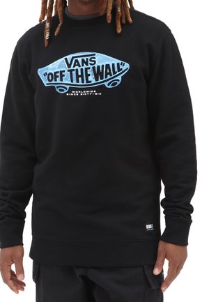 Zwarte sweatshirt met lange mouwen, voorzien van een blauwe "Vans Off The Wall" afbeelding en witte tekst, gemaakt van een zachte, gestructureerde stof.