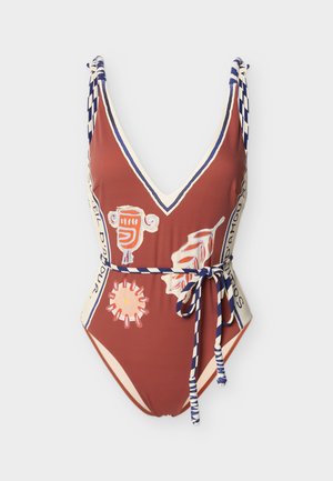 One-piece swimsuit in rust color with navy and cream striped trim, wrap belt, and abstract orange and white graphic prints.